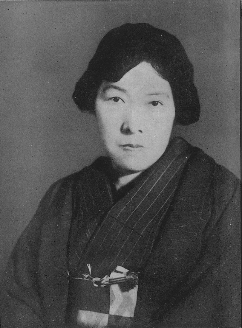Akiko Yosano in a striped kimono, photographed by 1942; portrait published in 1952.