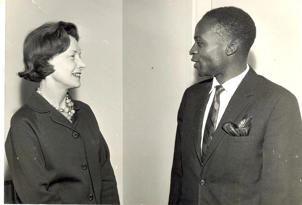 Barbara Castle at left meeting Malawian finance minister John Tembo in 1964–1965; the complete original scan, border and surface marks are retained.