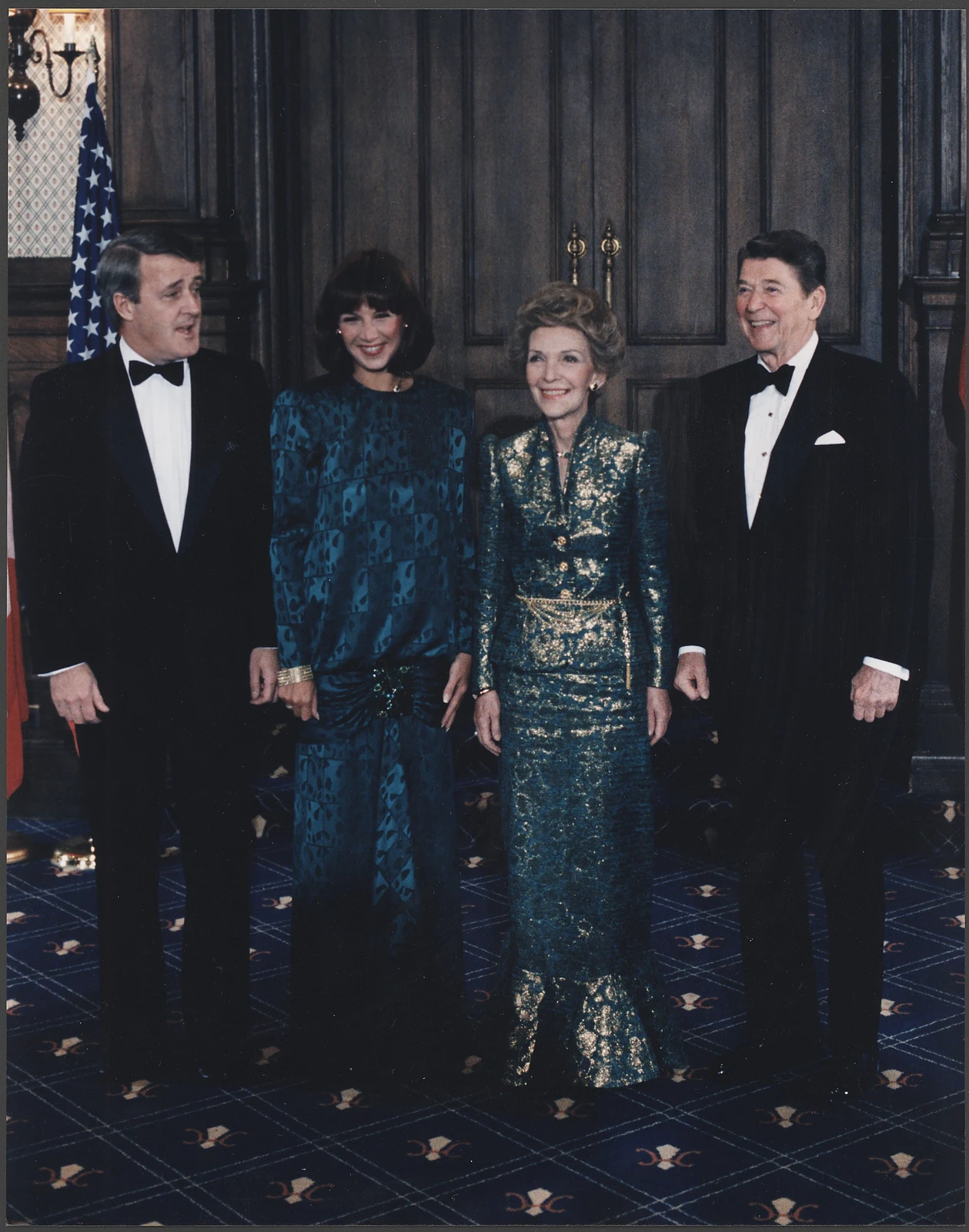Brian Mulroney at left with Mila Mulroney, Nancy Reagan and Ronald Reagan in Quebec on 18 March 1985; the full photograph and its border are retained.