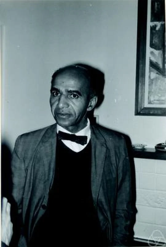 David Blackwell wearing a bow tie and jacket in a room in Seattle in 1967.
