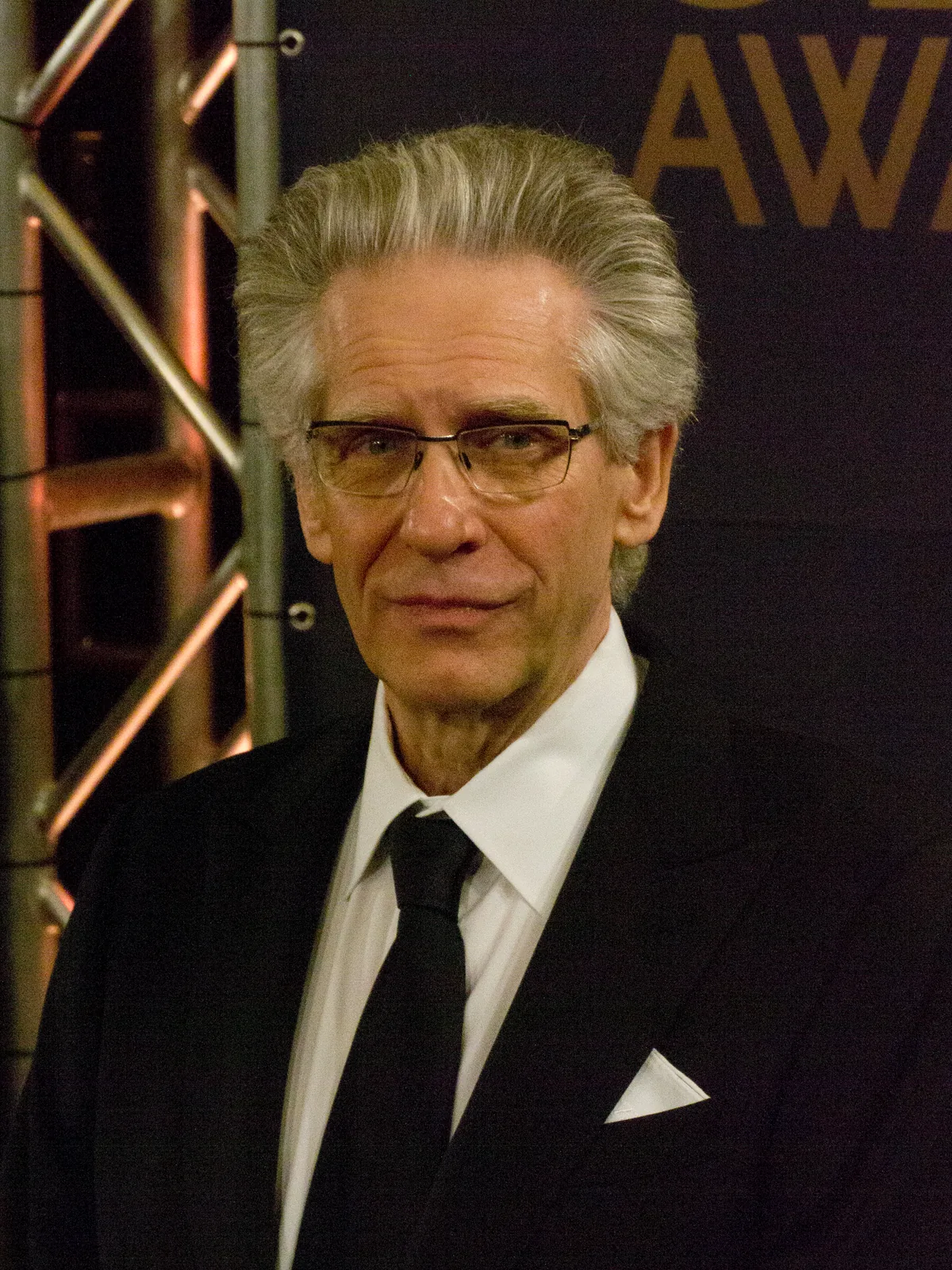 David Cronenberg in glasses and a dark suit at the 2012 Genie Awards in Toronto
