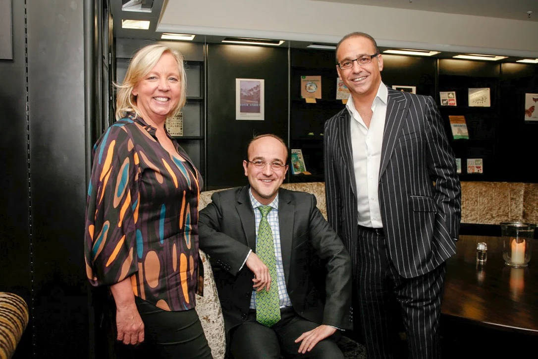 Deborah Meaden at left with seated Patrick van der Vorst in the centre and Theo Paphitis at right, in a complete 2011 group photograph.