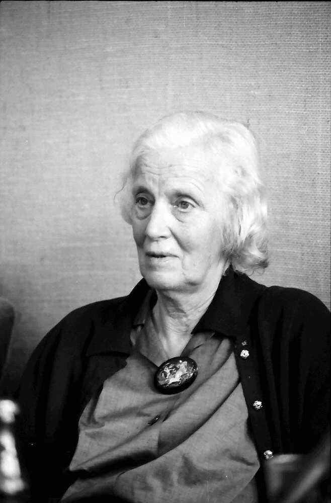 Dorothy Hodgkin seated at the 1983 Nobel laureate meeting, photographed by Willy Pragher.