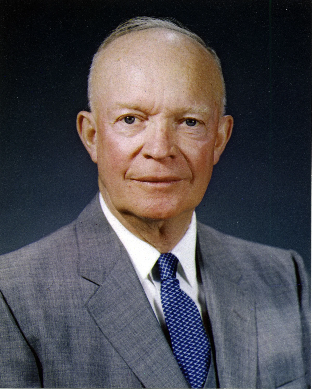 Dwight D. Eisenhower in an official White House photographic portrait dated 29 May 1959, wearing a gray suit and patterned blue tie.