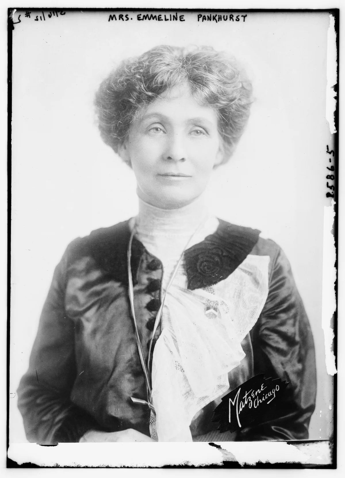 Emmeline Pankhurst in a studio portrait published by Bain News Service in 1912, with the complete glass-negative border and Matzene Chicago mark.