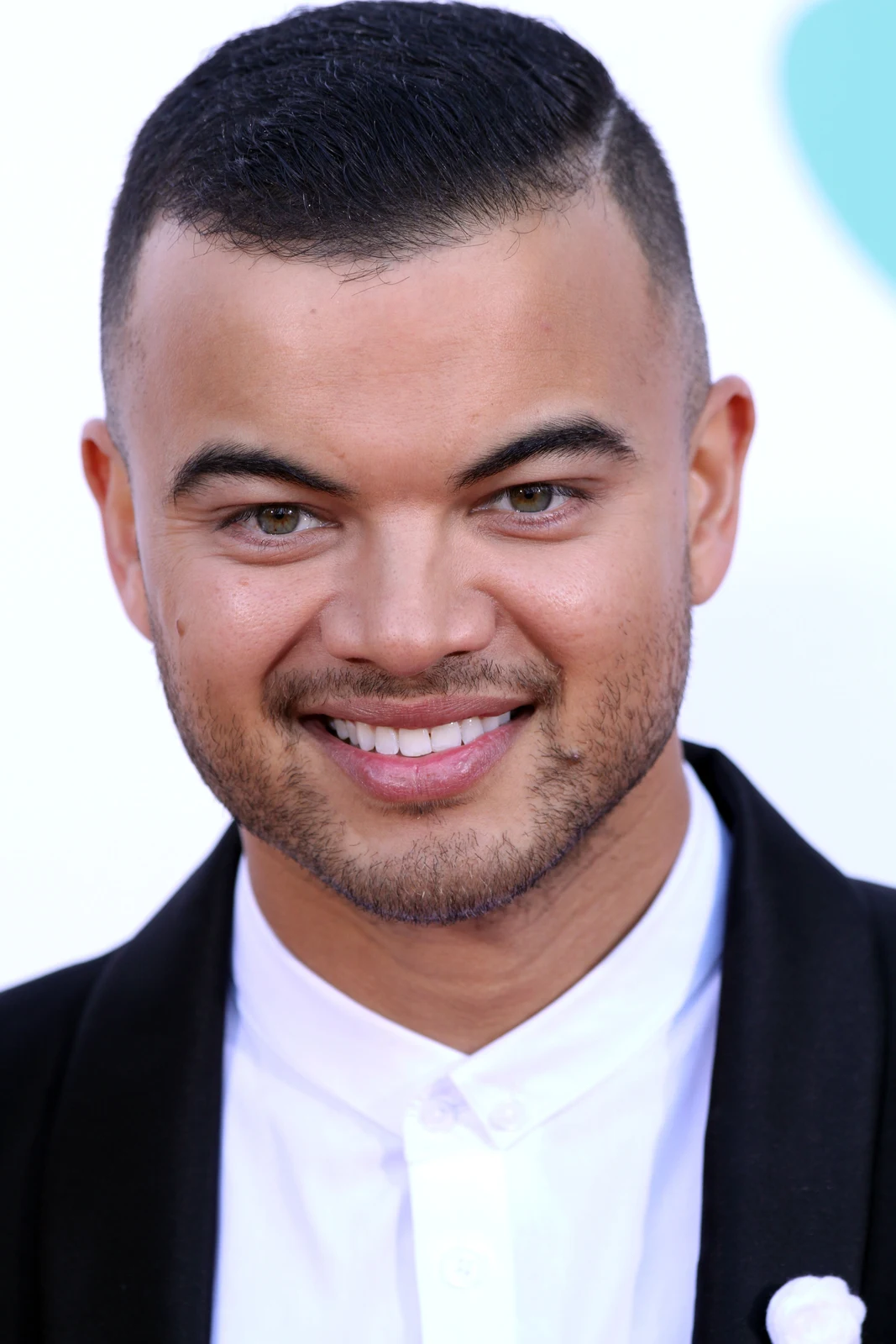 Guy Sebastian in a dark suit at the 2014 ARIA Awards, in the photographer’s complete supplied portrait frame.