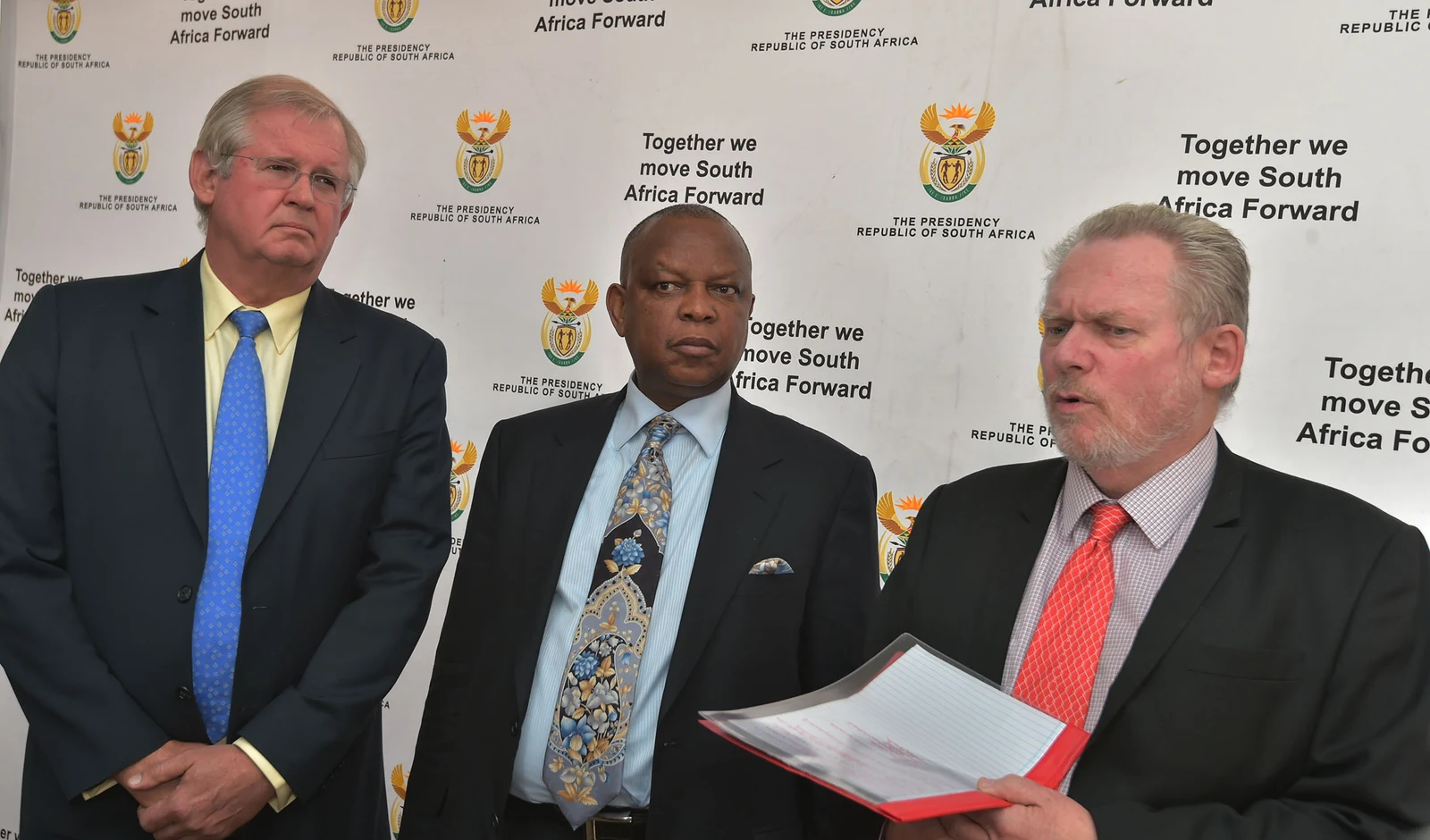 Jacko Maree at left in glasses and a blue tie, Ndaba Ntsele centre and Rob Davies right at a 2015 briefing; full frame retained.