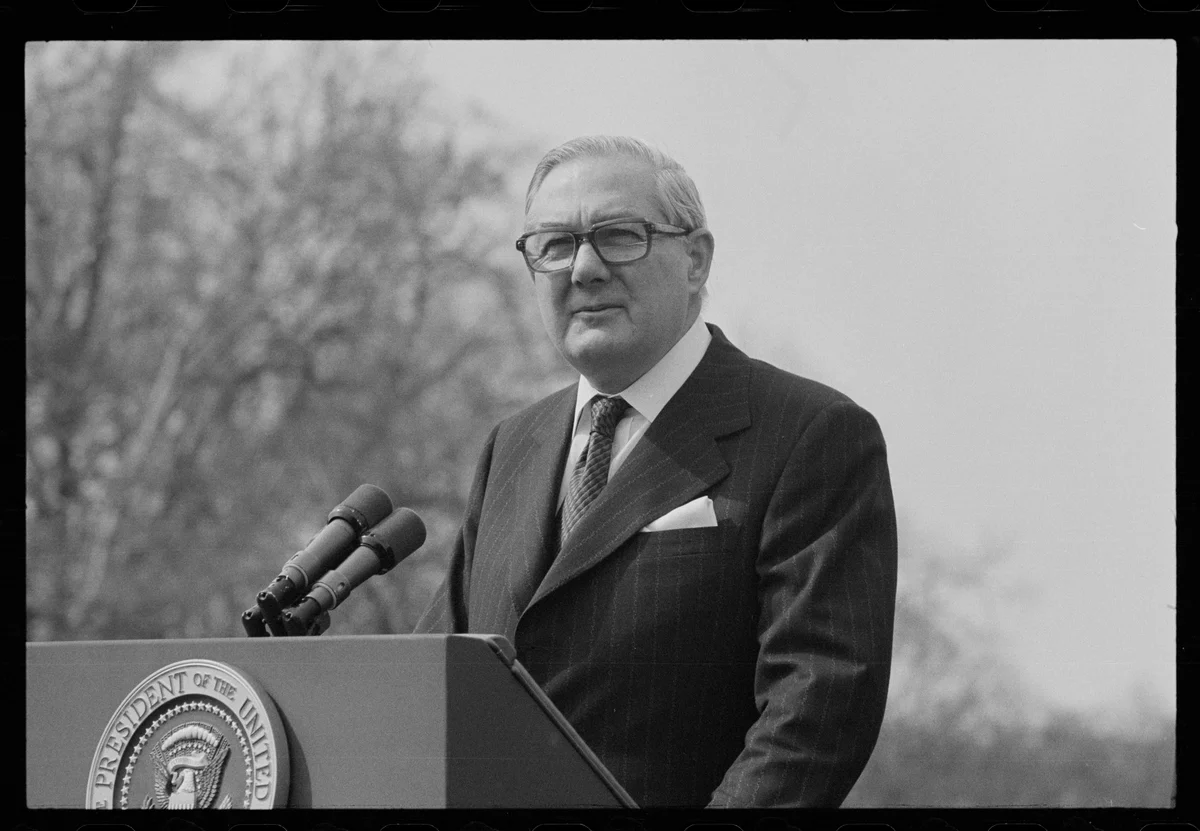 James Callaghan speaking at a White House lectern on 10 March 1977, with the complete negative border visible.