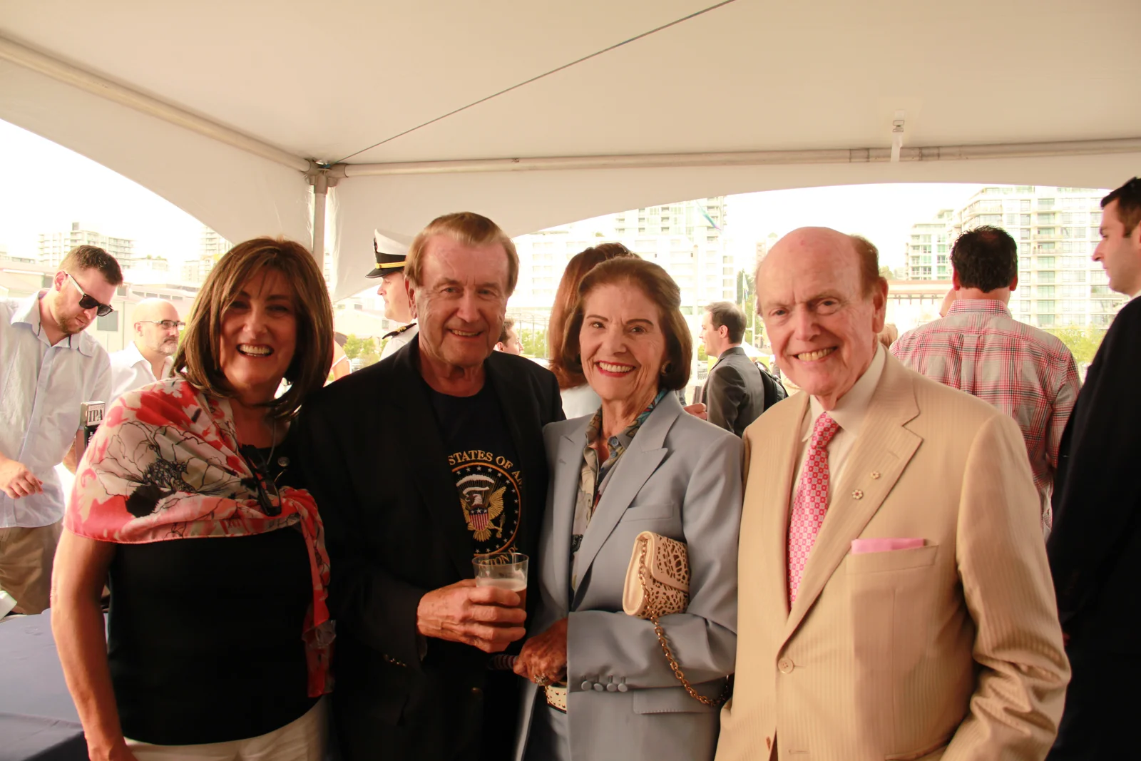 Jim Pattison stands at the far right of the complete July 2015 reception group photograph, wearing a pale suit and pink tie.