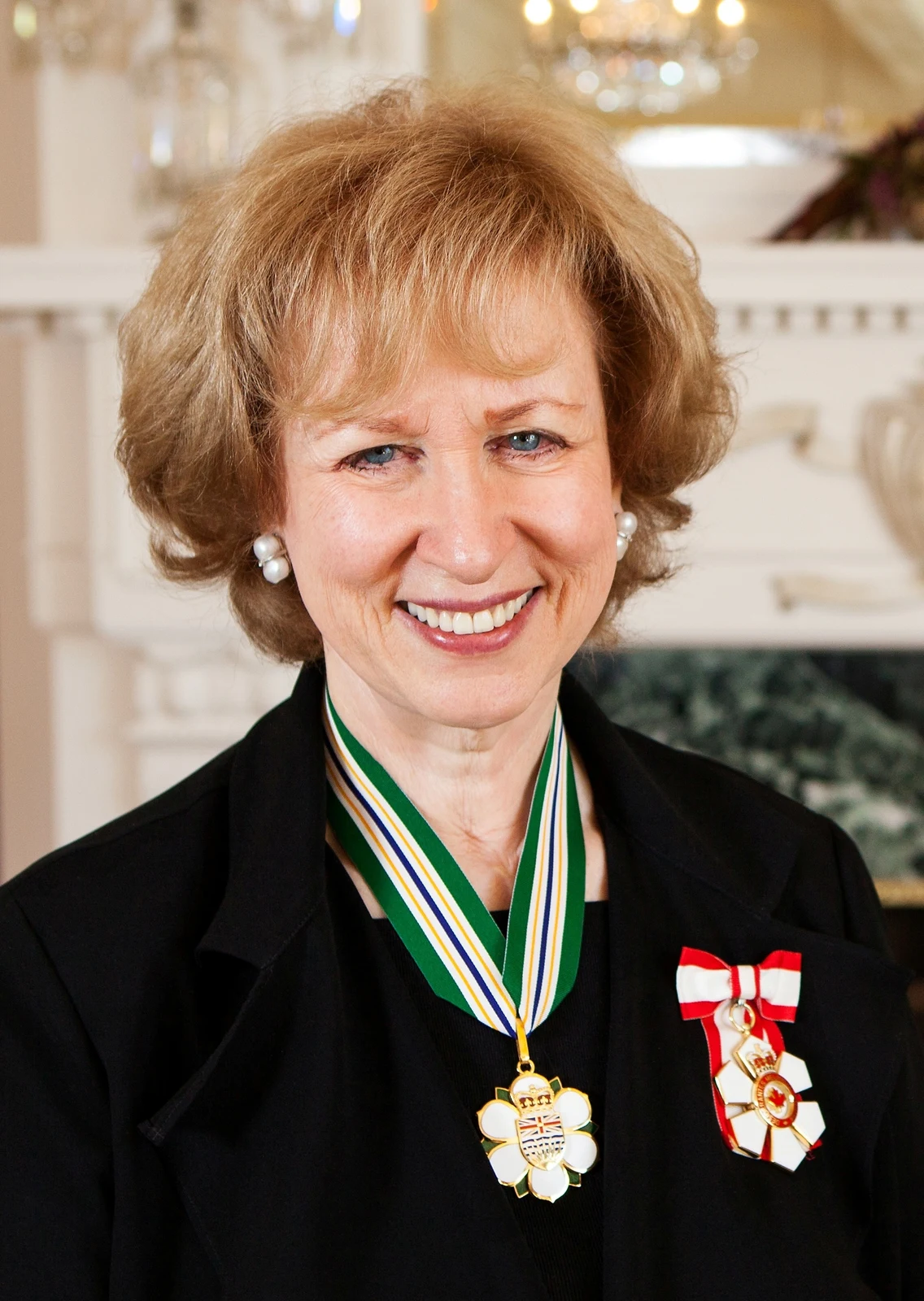 Kim Campbell wearing the insignia of the Order of British Columbia and Order of Canada in a supplied portrait dated September 2012.