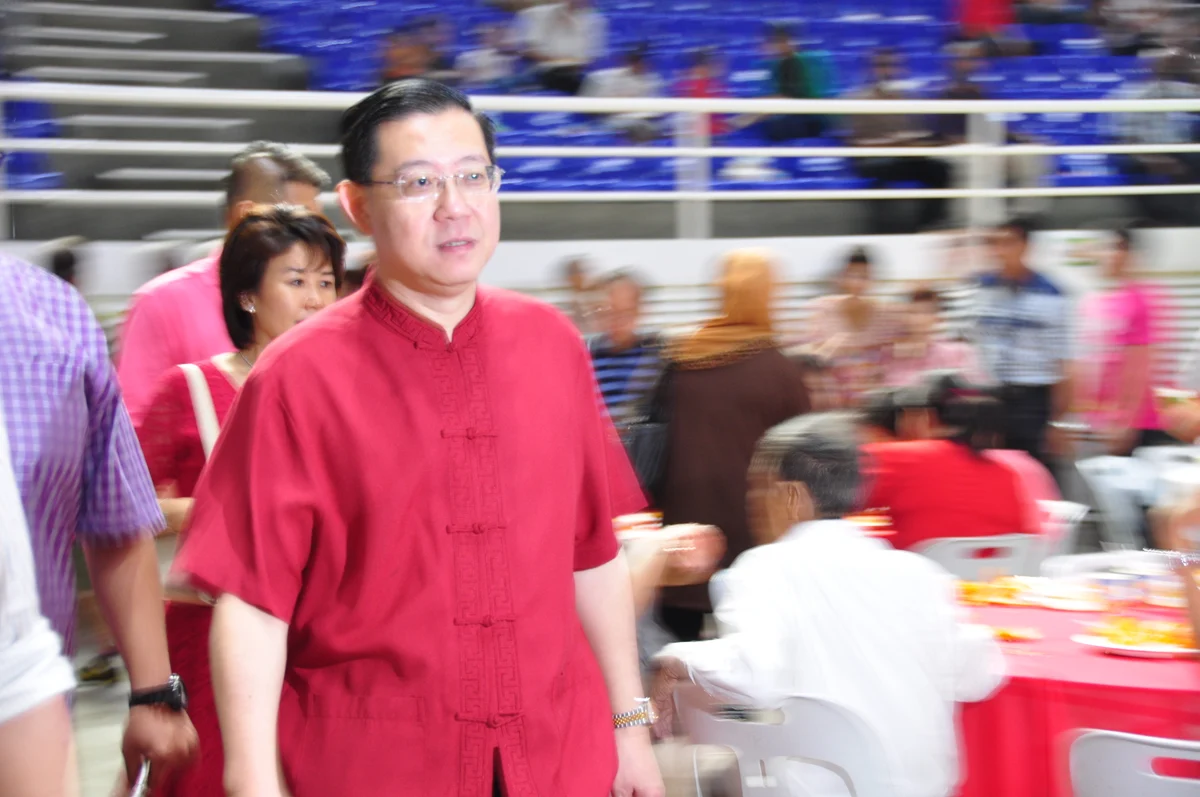 Lim Guan Eng in a red shirt at a gathering in Penang in 2014.