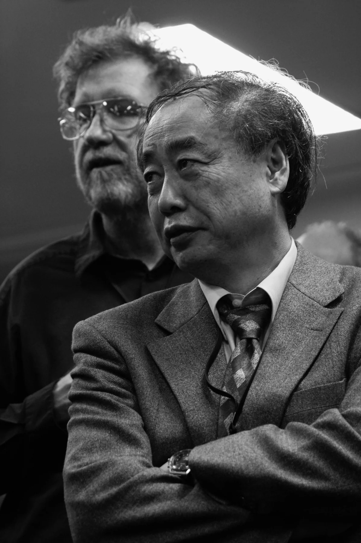 Makoto Kobayashi in Marcella Bona’s complete supplied photograph, with another attendee behind him.