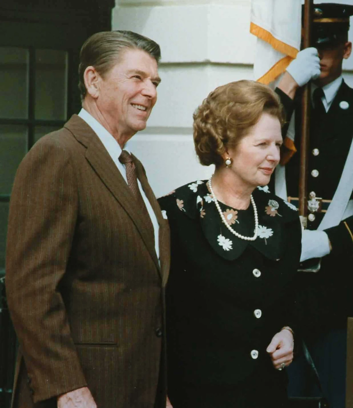 Margaret Thatcher standing beside Ronald Reagan at the White House on 29 September 1983.