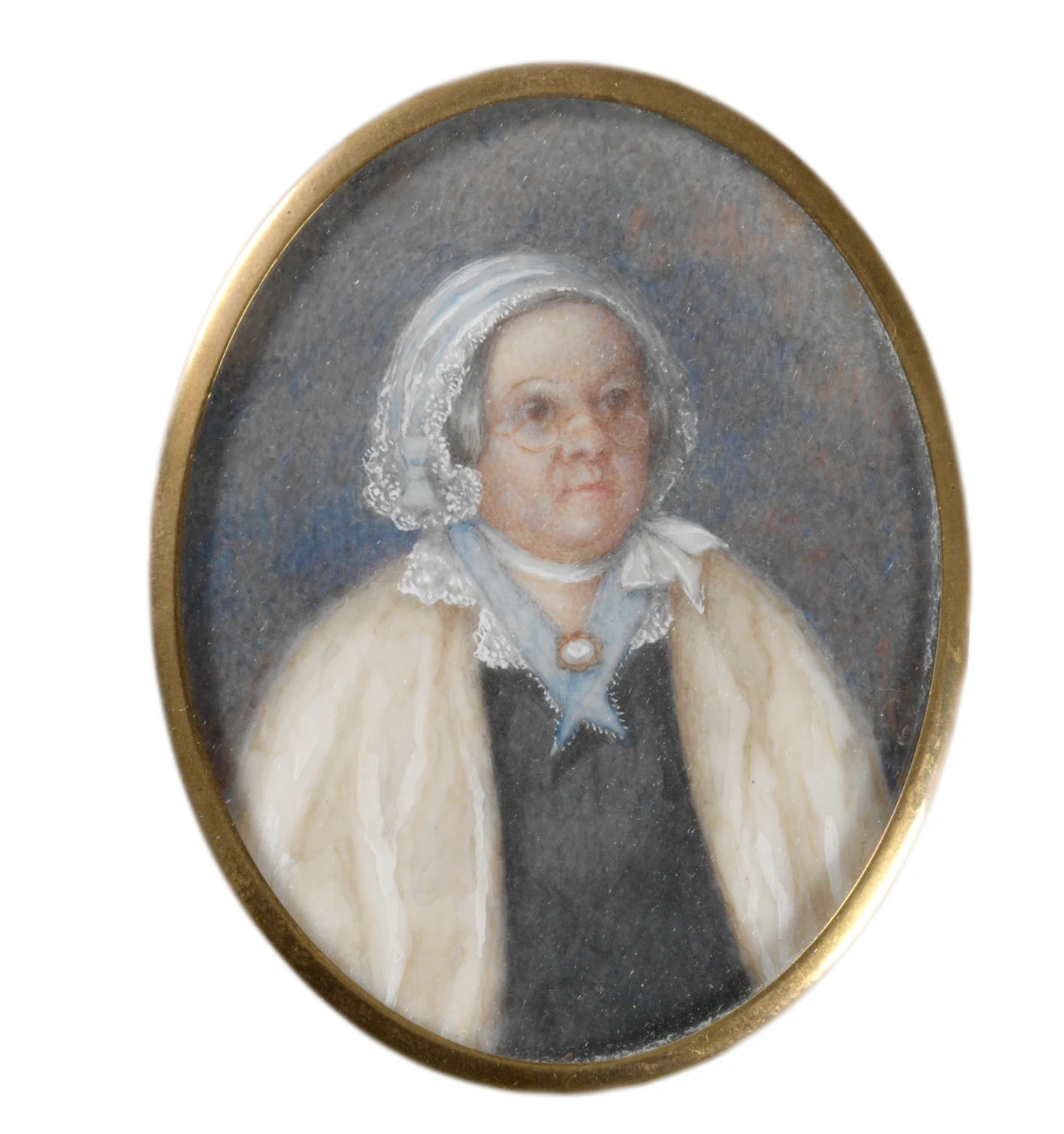 The complete oval gold-framed watercolour miniature of Mary Reibey, circa 1835, showing her in spectacles, a white cap and cream shawl; this is historical artwork, not a photographic portrait.