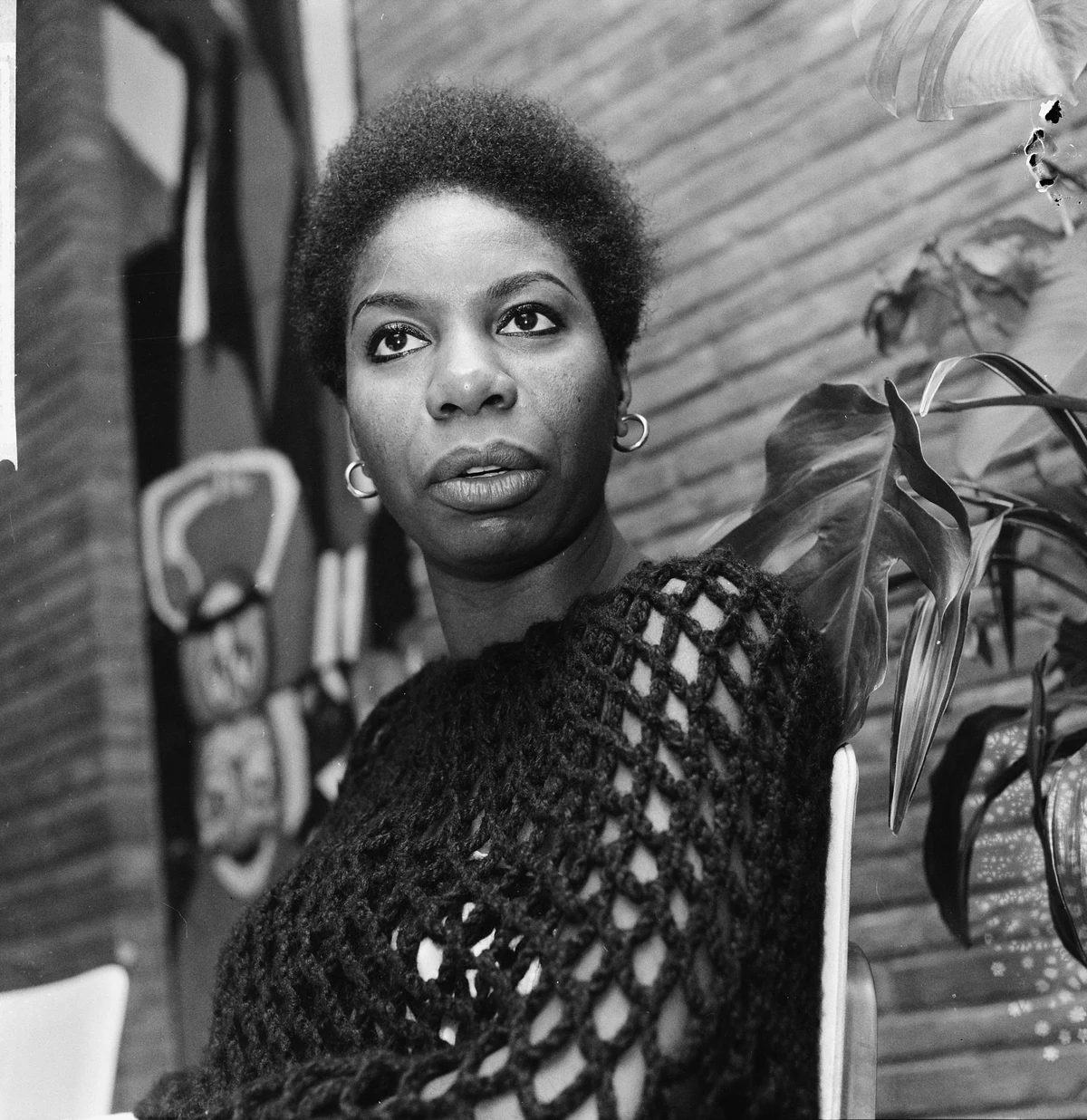 Nina Simone in Ron Kroon's portrait of 14 December 1965, including the complete supplied scan, white left edge and visible upper-right negative damage.