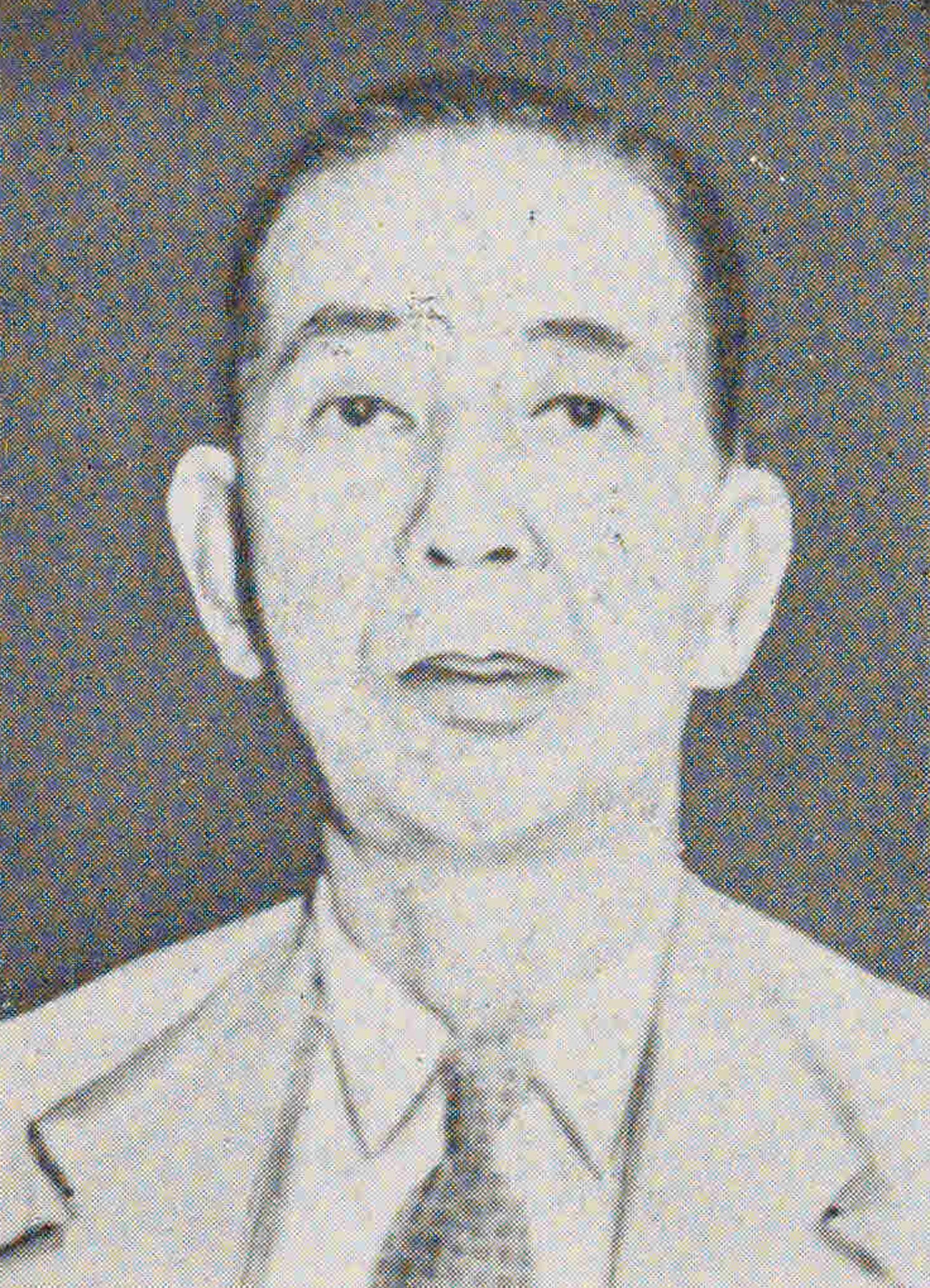 Nobusuke Kishi wearing a suit and tie, in the complete supplied National Diet Library portrait.