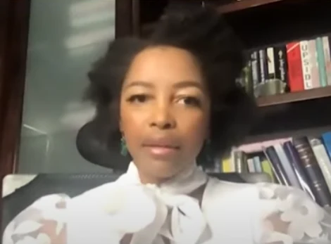 Phuthi Mahanyele-Dabengwa in the supplied low-resolution 2021 Davos Agenda video still, seated before bookshelves.