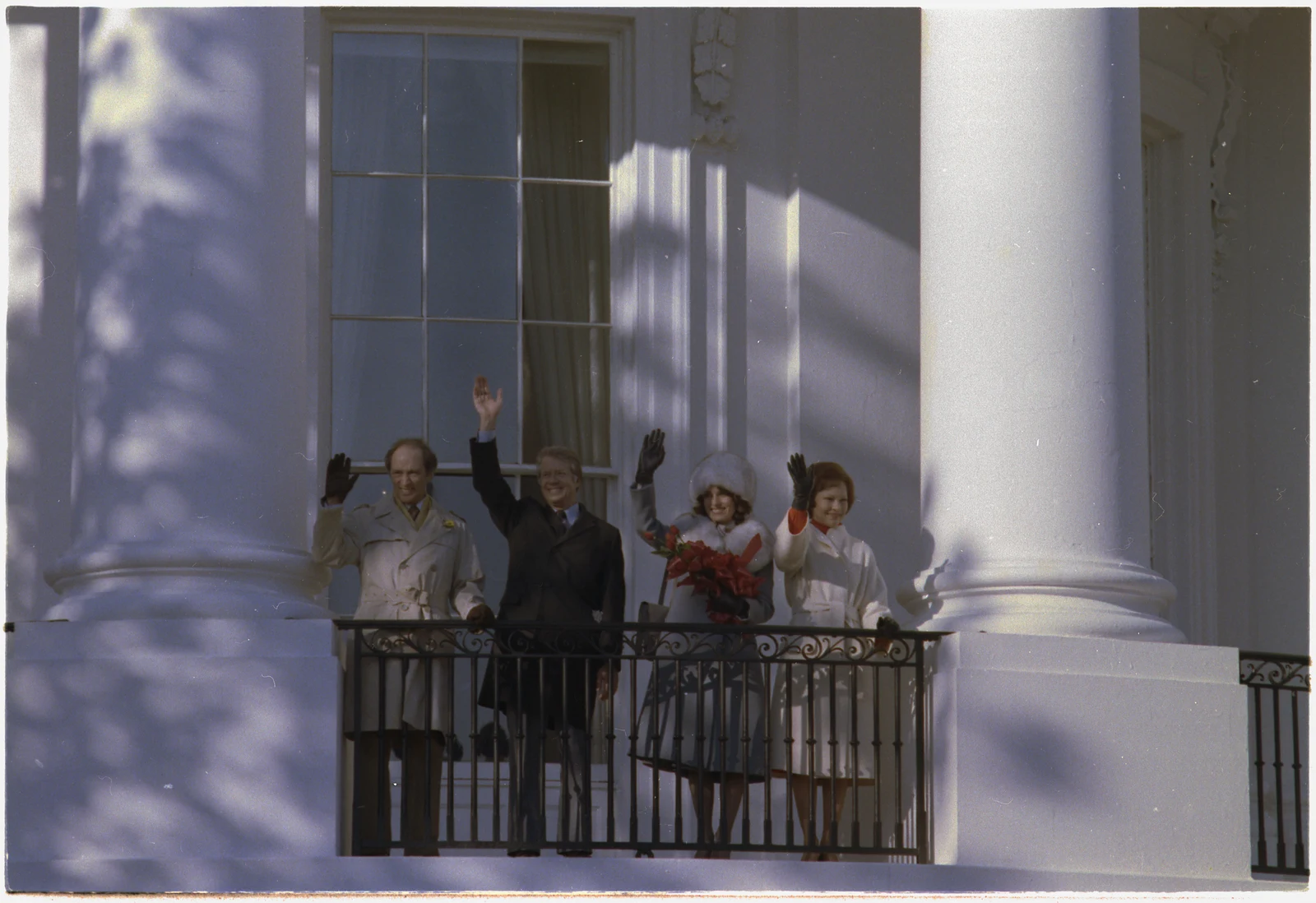 Pierre Trudeau at left with Jimmy Carter, Margaret Trudeau and Rosalynn Carter, waving from the White House during the February 1977 state visit; the full archive frame is retained.