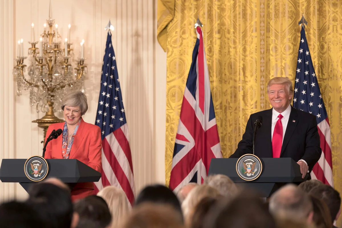 Theresa May at left with Donald Trump during their White House press conference on 27 January 2017; both leaders and the complete supplied scene are retained.