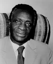 Thomas Adeoye Lambo in the complete supplied black-and-white portrait dated1997 by its photographer.
