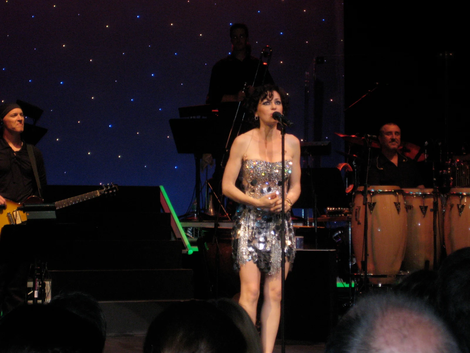 Tina Arena singing at centre stage at Sydney’s State Theatre in March 2009, with the musicians and full supplied stage frame retained.