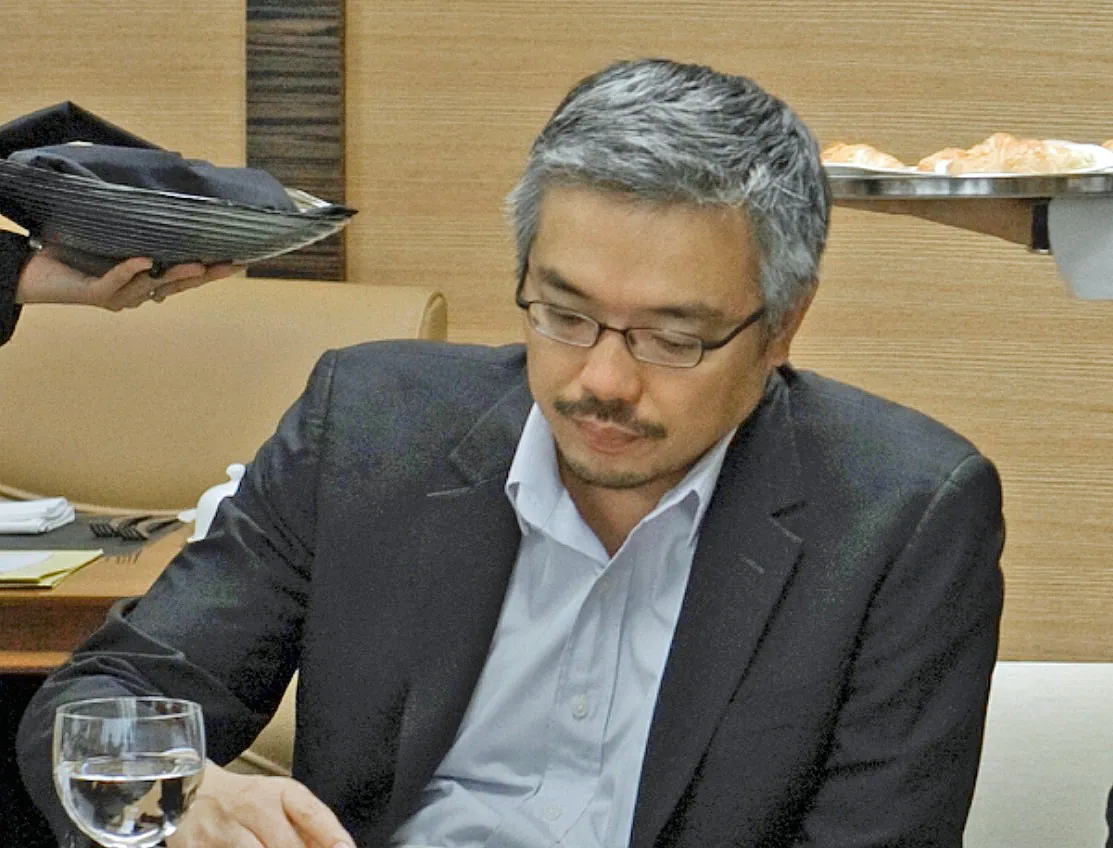 Tos Chirathivat at a public event in 2013