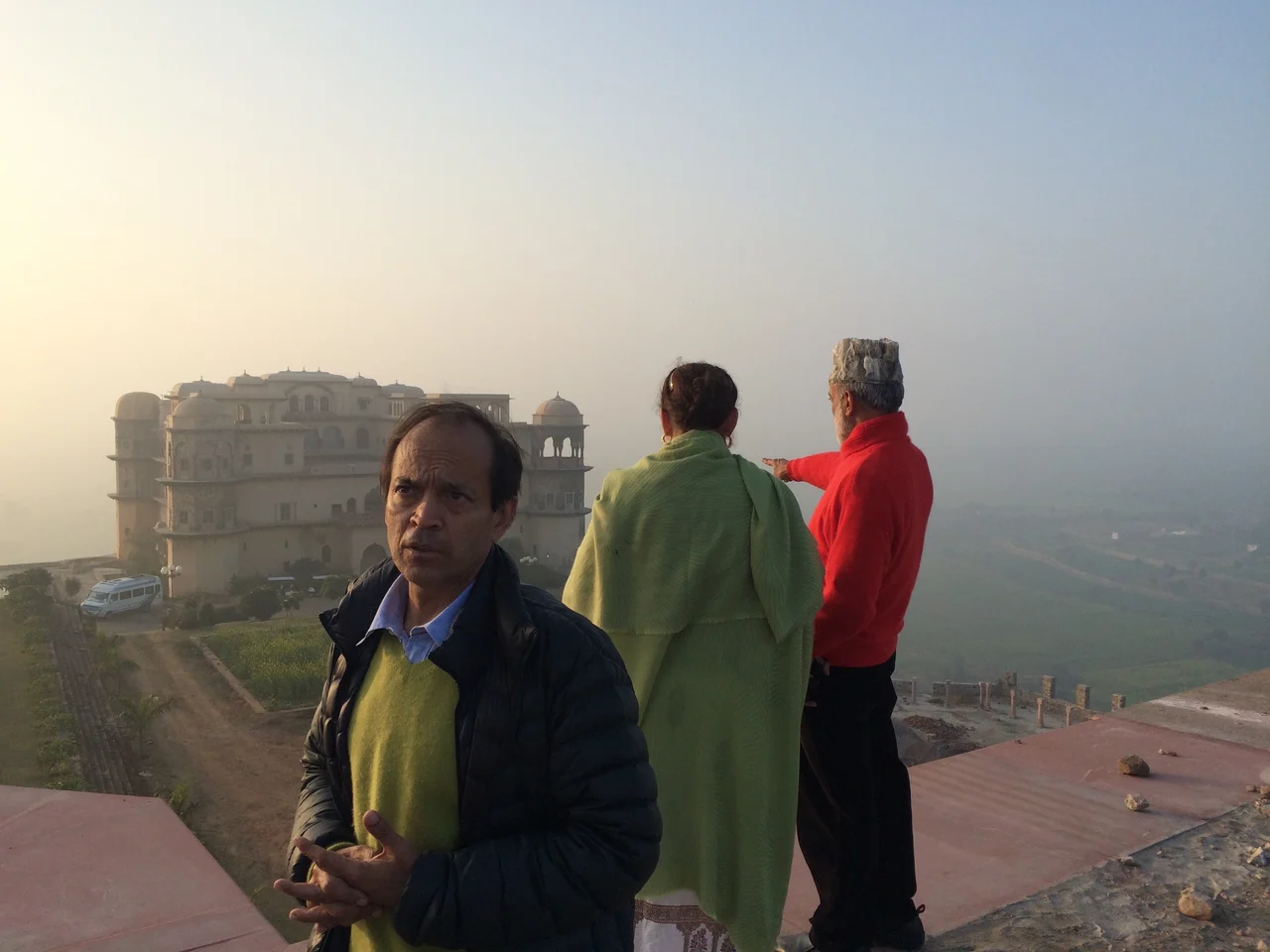 Vikram Seth in the left foreground of an outdoor group photograph in India in 2015