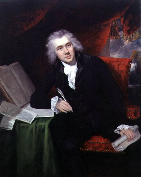 Complete circa-1790 painting of William Wilberforce by John Rising, seated with papers and a quill beside a table.